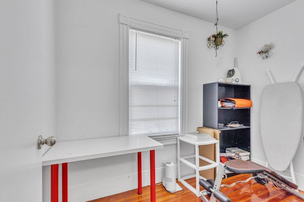 49 Laurel Street Watertown, MA 02472 - Photo 19 of 42 a workspace with furniture and window