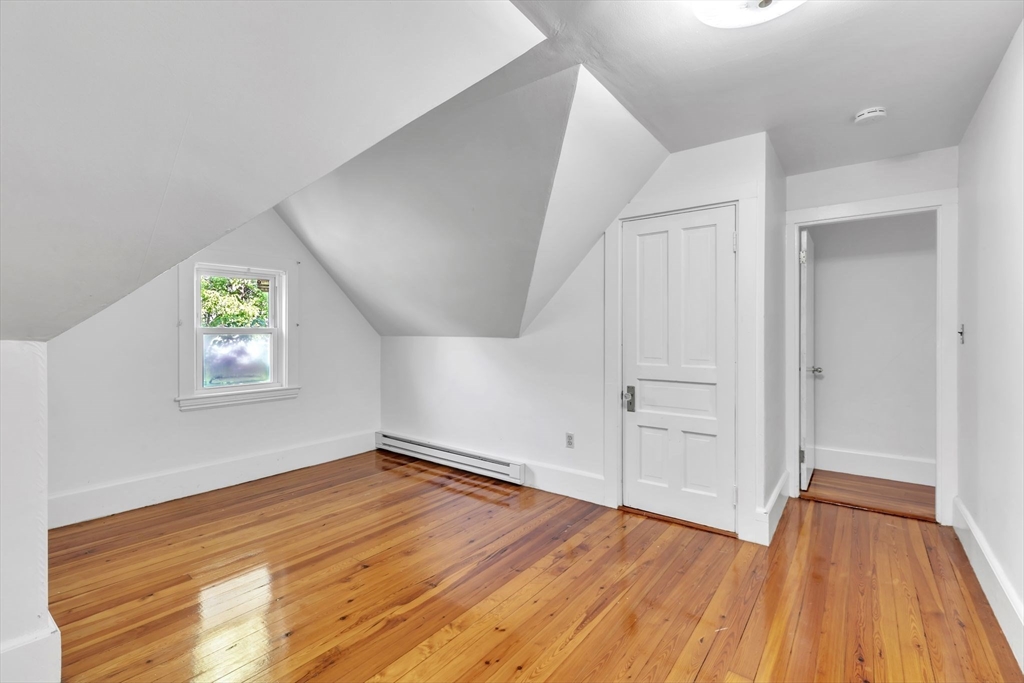 49 Laurel Street Watertown, MA 02472 - Photo 27 of 42 wooden floor in an empty room