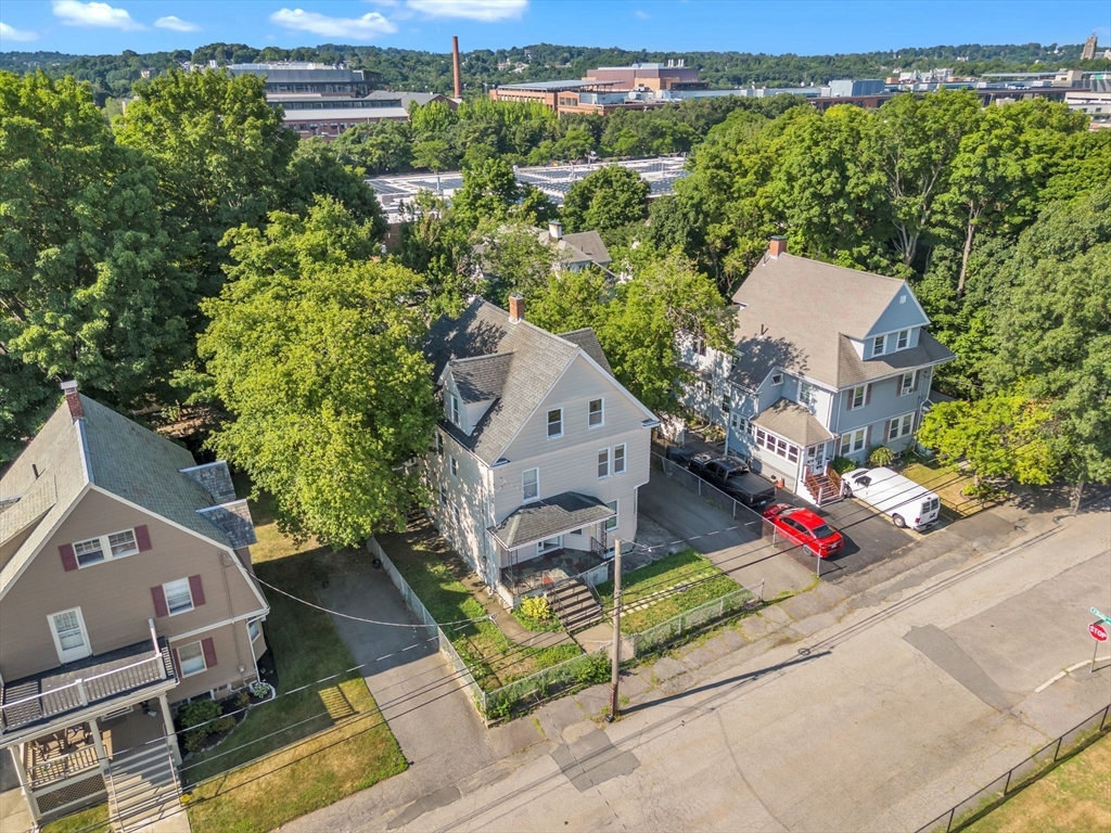 49 Laurel Street Watertown, MA 02472 - Photo 4 of 42 an aerial view of a house with a yard