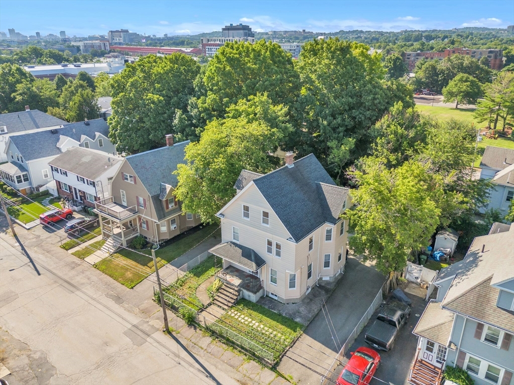 49 Laurel Street Watertown, MA 02472 - Photo 5 of 42 an aerial view of a house with a garden