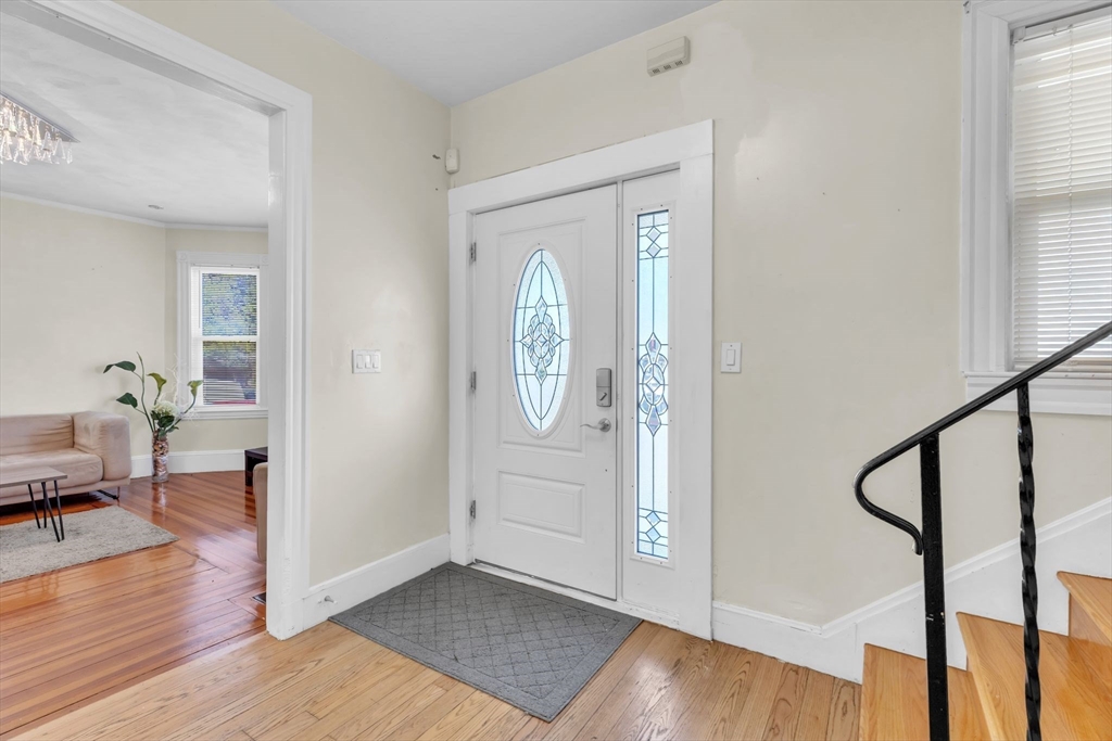 49 Laurel Street Watertown, MA 02472 - Photo 8 of 42 a view of entryway with wooden floor