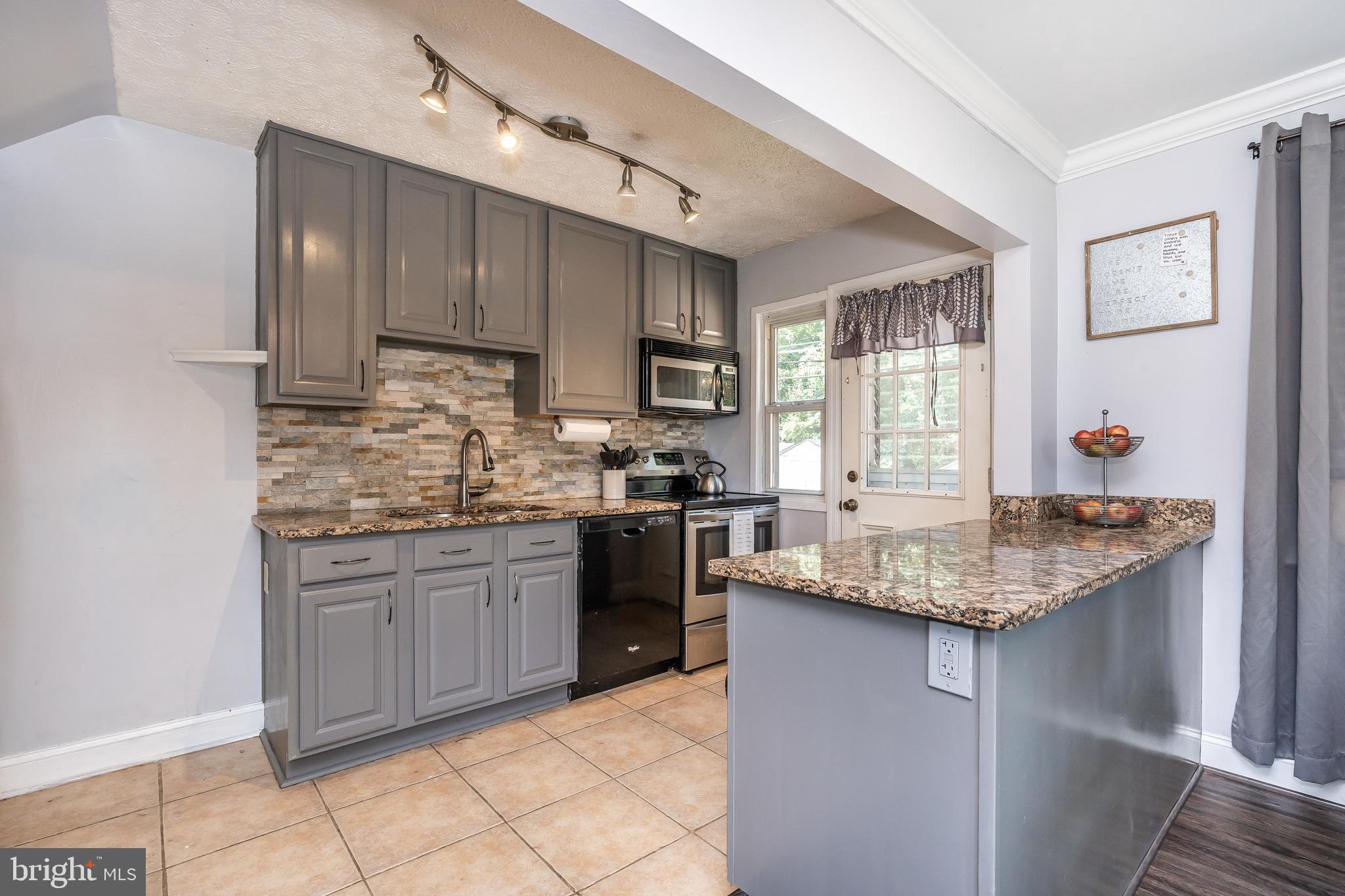 1224 Elm Road Baltimore, MD 21227 - Photo 2 of 36 Gleaming kitchen.