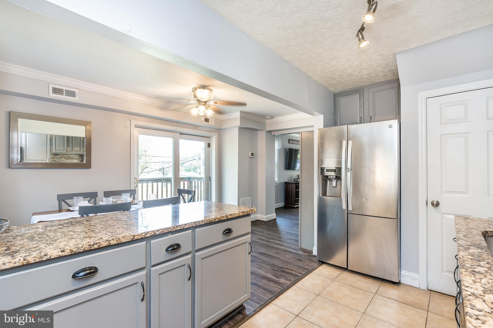 1224 Elm Road Baltimore, MD 21227 - Photo 12 of 36 Granite counters and large island.