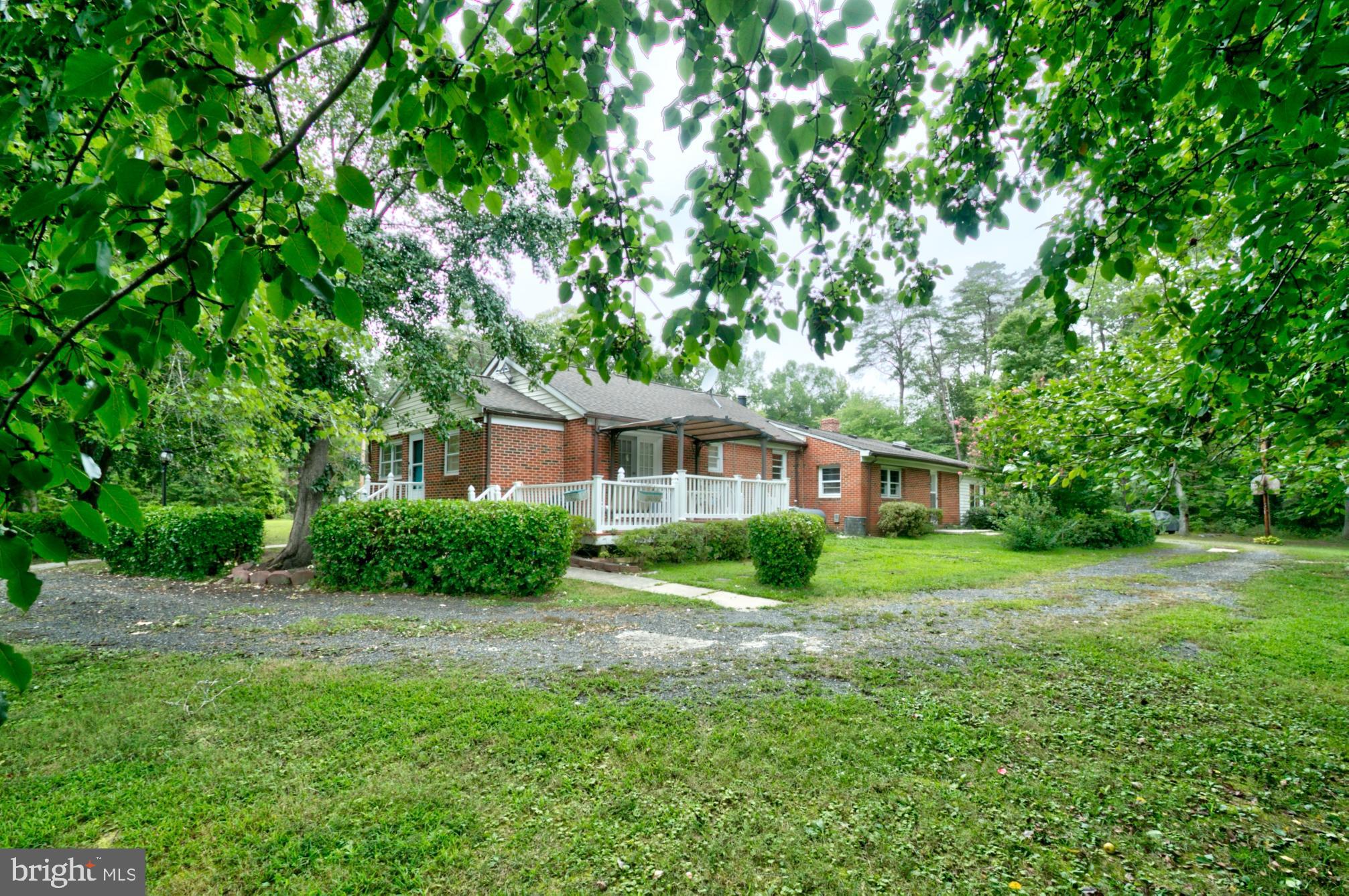 9120 Bowie Road Nanjemoy, MD 20662 - Photo 22 of 28 a front view of a house with a yard