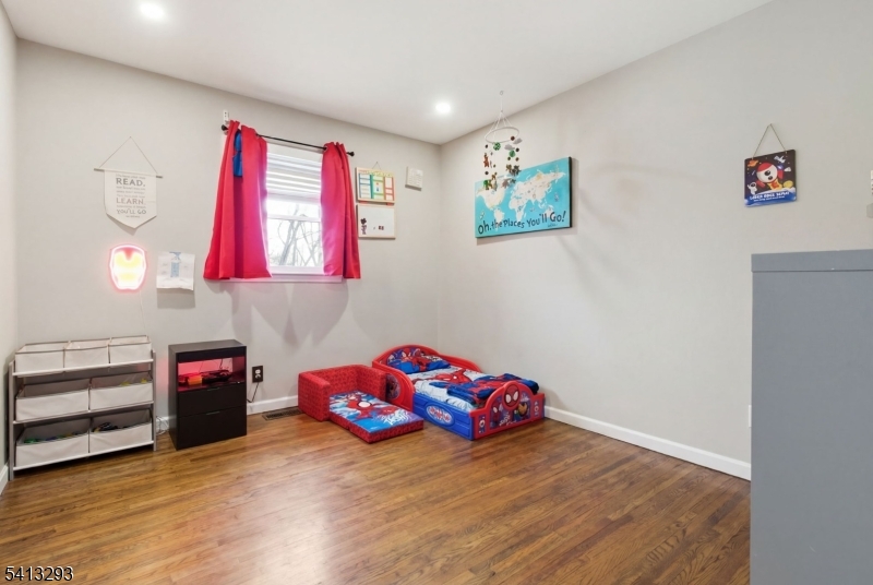 3 Gardenia Road Vernon, NJ 07418 - Photo 14 of 22 a bedroom with furniture and a wooden floor