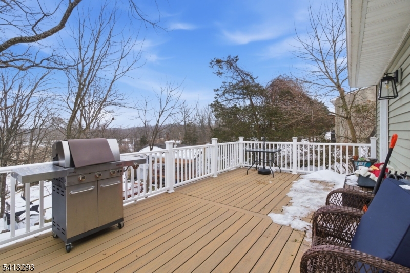 3 Gardenia Road Vernon, NJ 07418 - Photo 20 of 22 a balcony with furniture and wooden floor