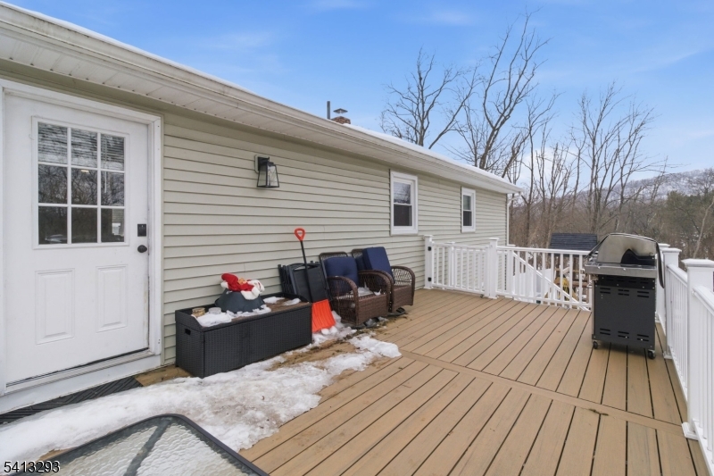 3 Gardenia Road Vernon, NJ 07418 - Photo 21 of 22 a view of a deck with furniture and wooden floor