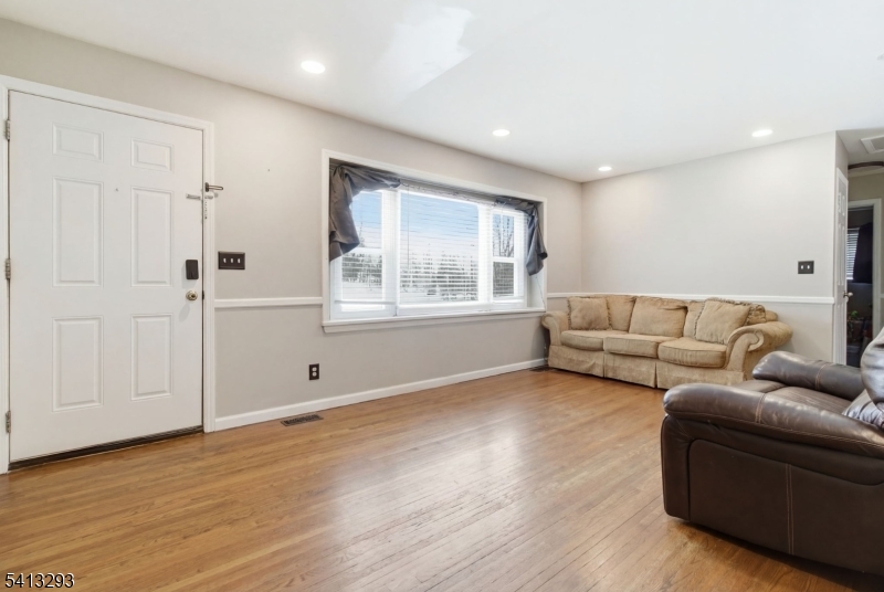 3 Gardenia Road Vernon, NJ 07418 - Photo 6 of 22 a living room with furniture and a window
