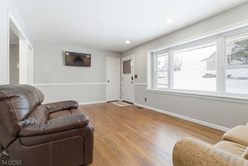 3 Gardenia Road Vernon, NJ 07418 - Photo 7 of 22 a living room with furniture and a window