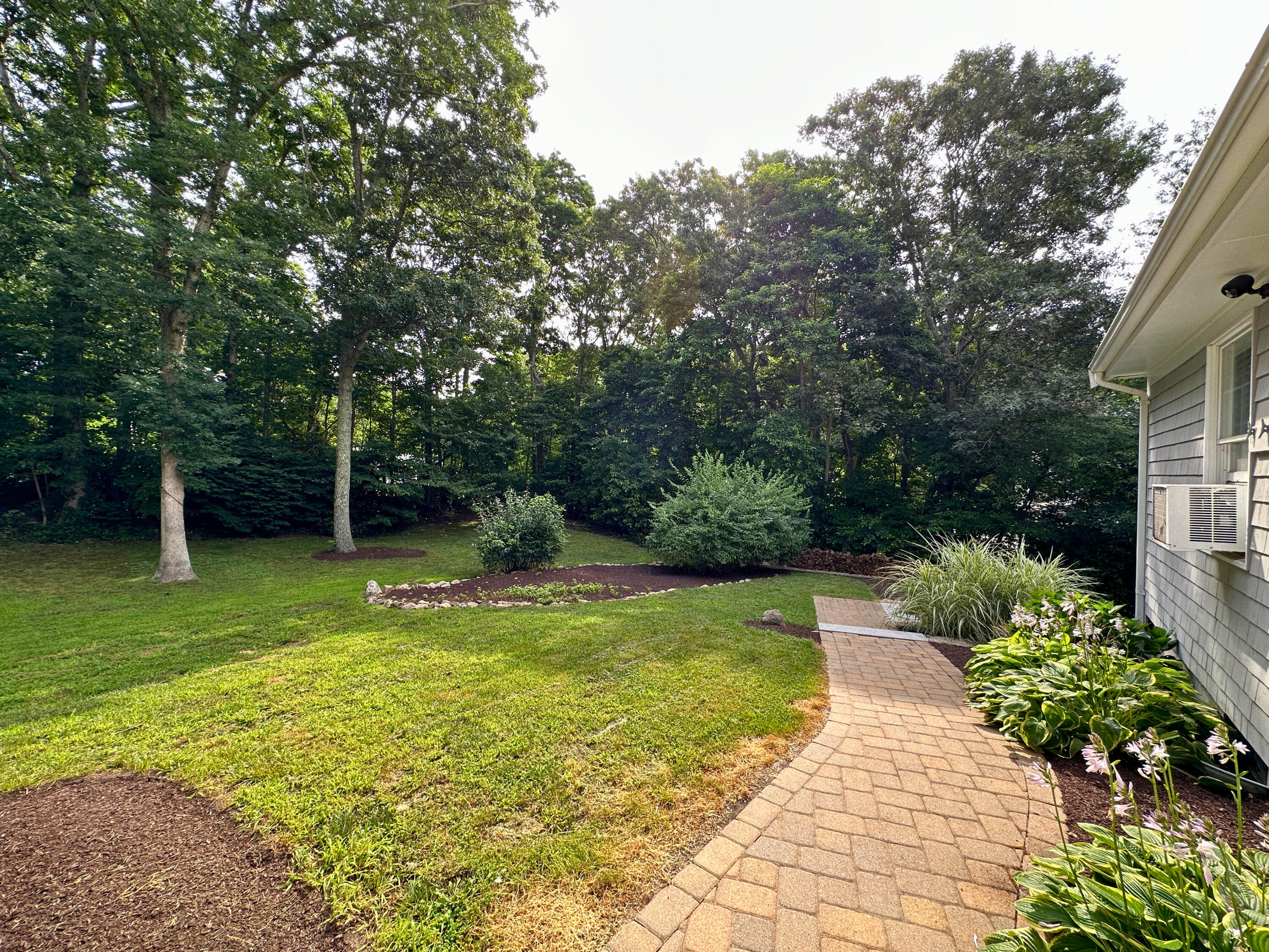 15 Surrey Lane Sandwich, MA 02563 - Photo 14 of 51 a view of a swimming pool with a patio