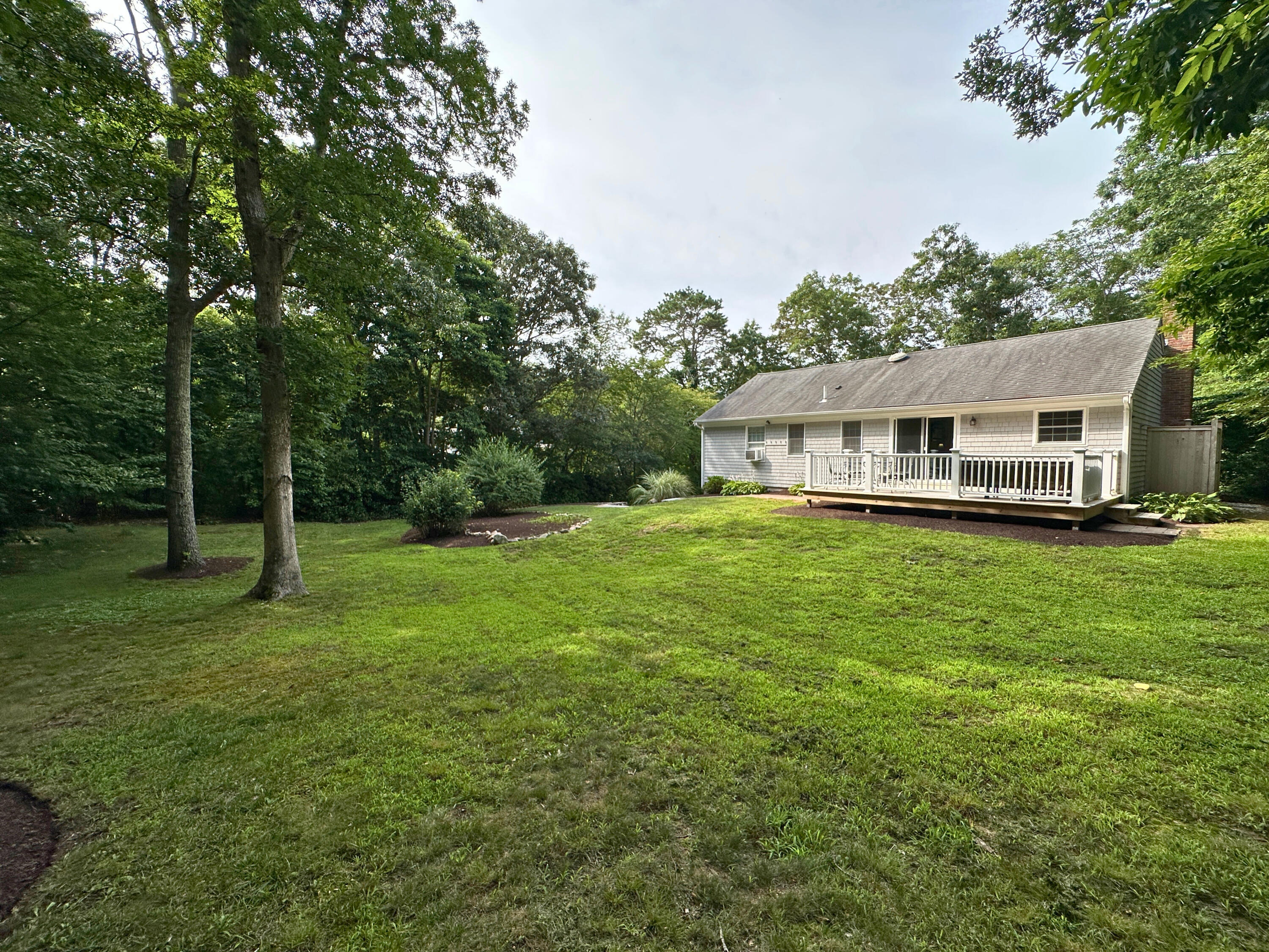 15 Surrey Lane Sandwich, MA 02563 - Photo 16 of 51 a view of a house with a big yard