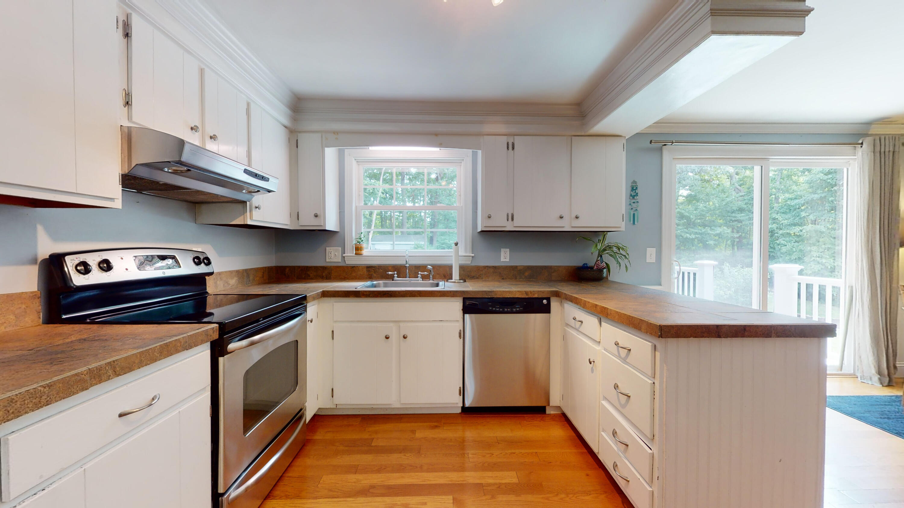 15 Surrey Lane Sandwich, MA 02563 - Photo 26 of 51 a kitchen with granite countertop cabinets stainless steel appliances a sink and a window