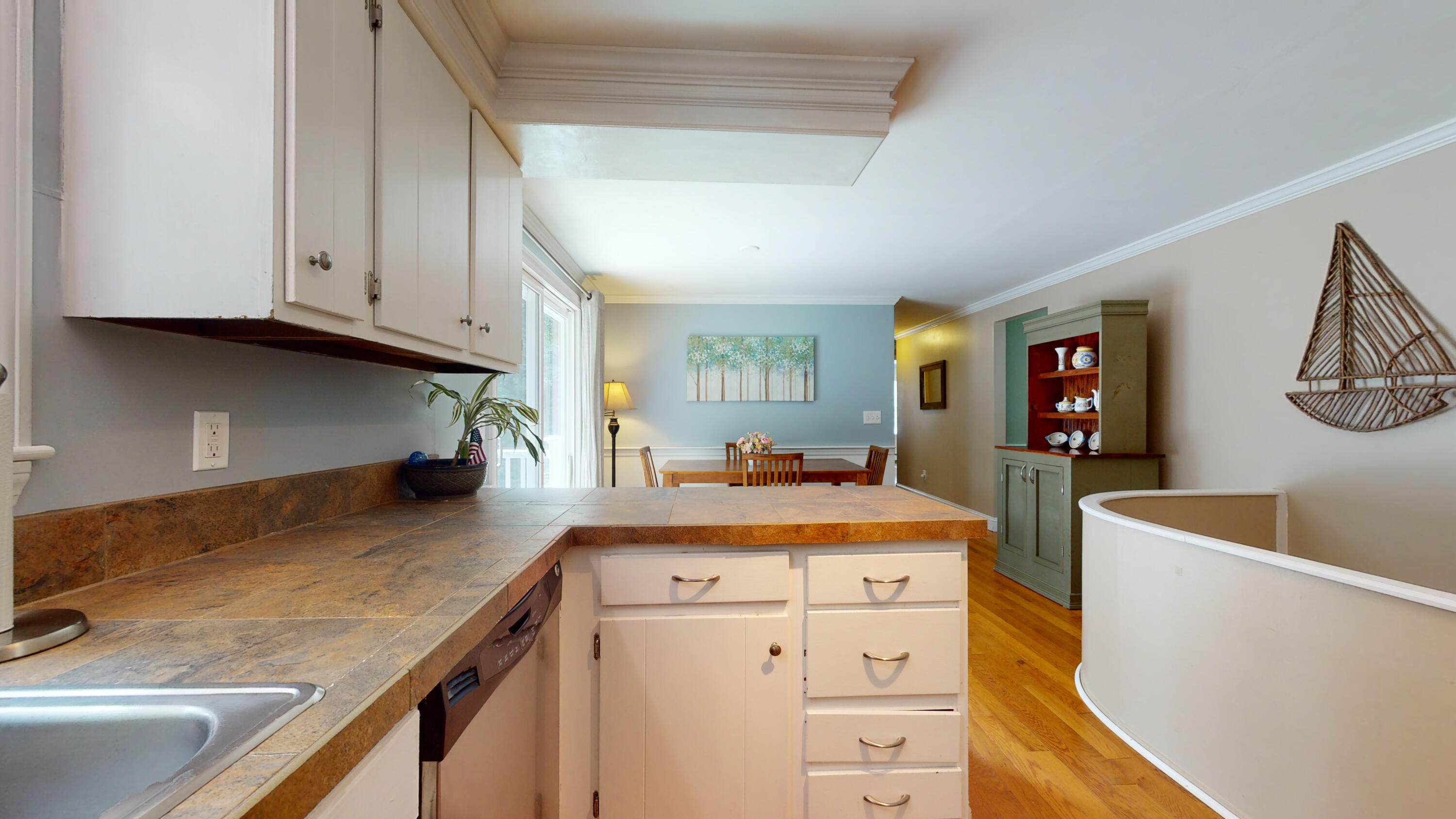 15 Surrey Lane Sandwich, MA 02563 - Photo 28 of 51 a kitchen that has a sink and a stove