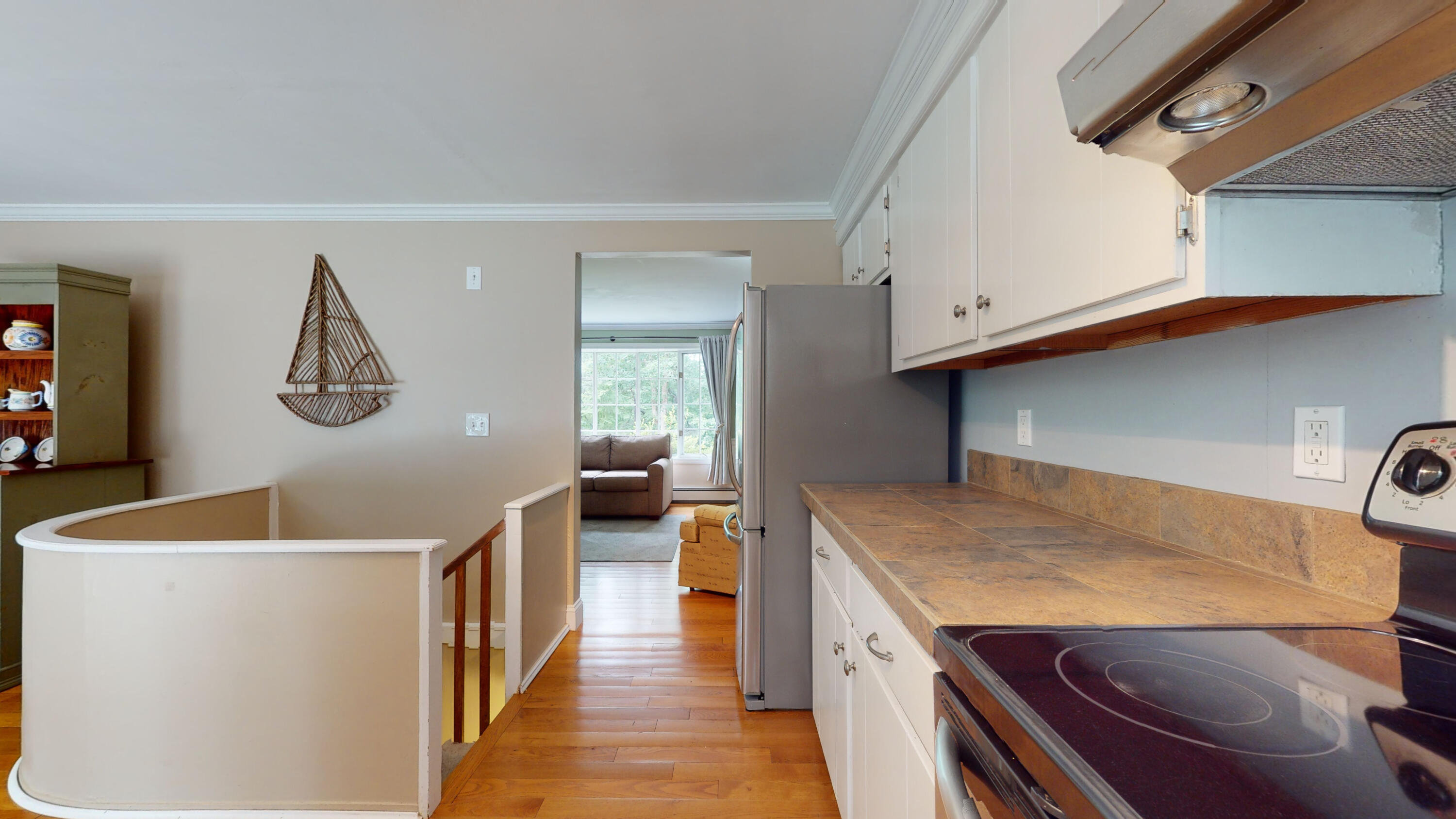 15 Surrey Lane Sandwich, MA 02563 - Photo 29 of 51 a kitchen with a sink and a refrigerator