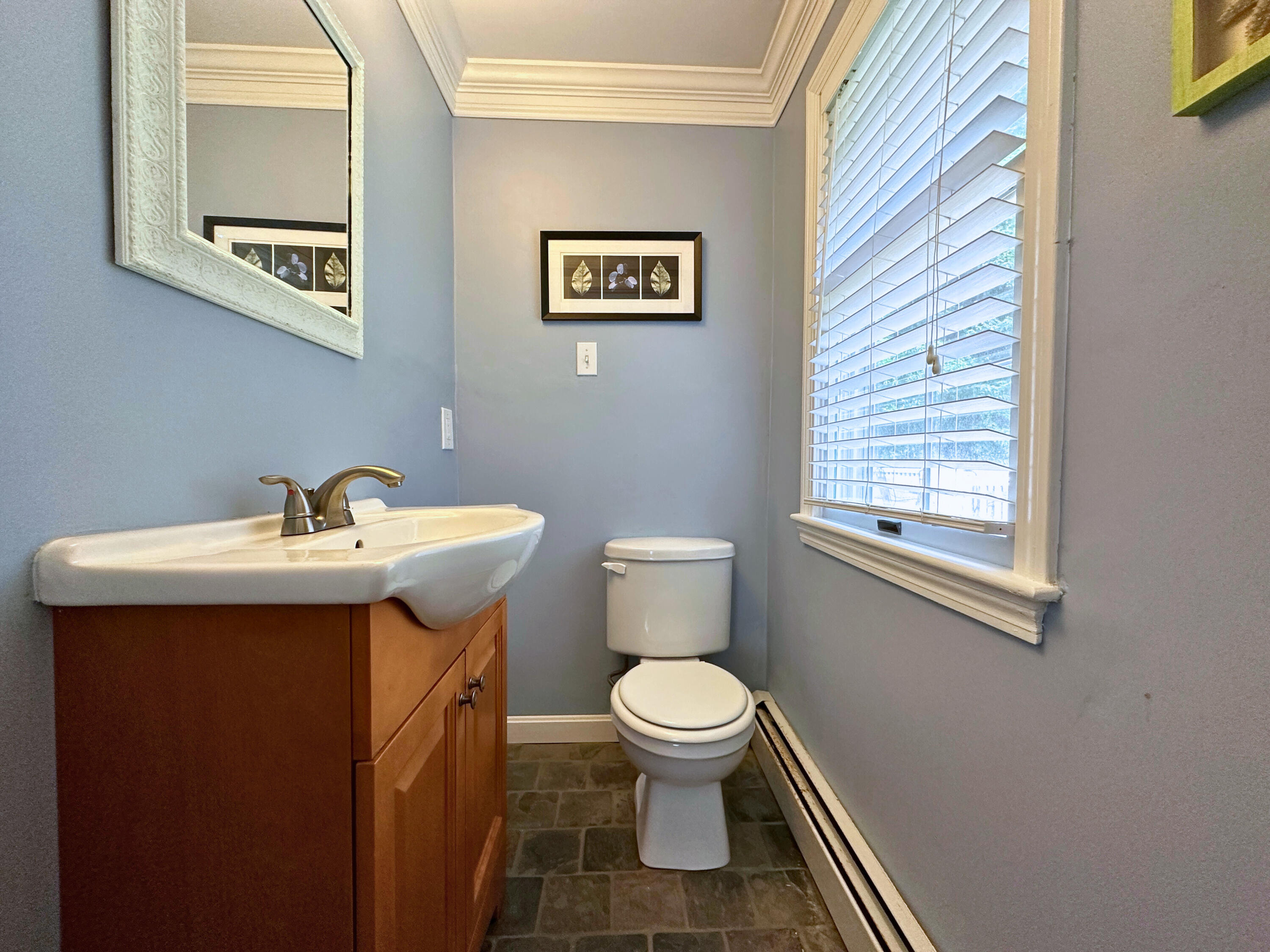 15 Surrey Lane Sandwich, MA 02563 - Photo 40 of 51 a bathroom with a sink toilet and window