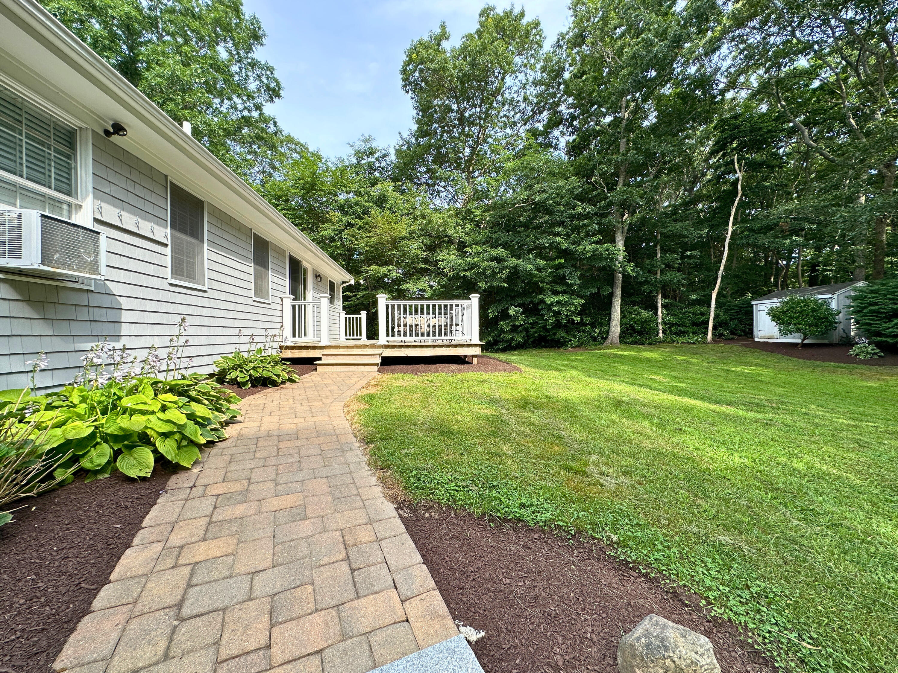 15 Surrey Lane Sandwich, MA 02563 - Photo 10 of 51 a front view of a house with garden