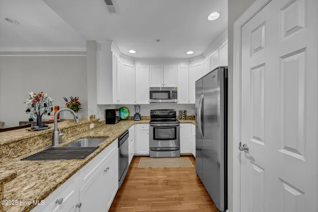 $267,000 | 215 Valencia Court, Unit 203, Wilmington, NC 28412