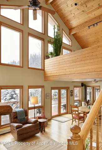 a view of a kitchen and dining room