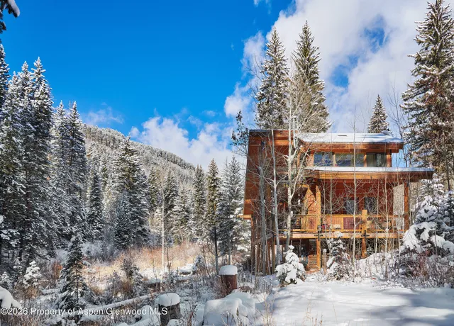 a view of a chairs and tables in the patio