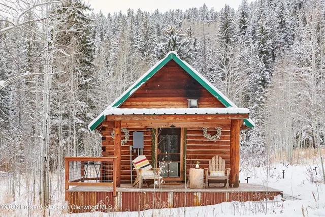 a view of mountain view with lots of trees