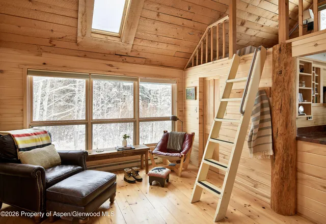 a kitchen with stainless steel appliances granite countertop a refrigerator a stove top oven a sink and dishwasher