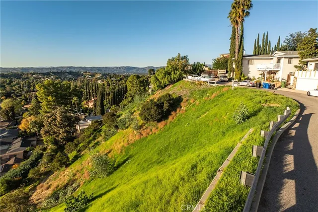 a view of a yard with an outdoor space