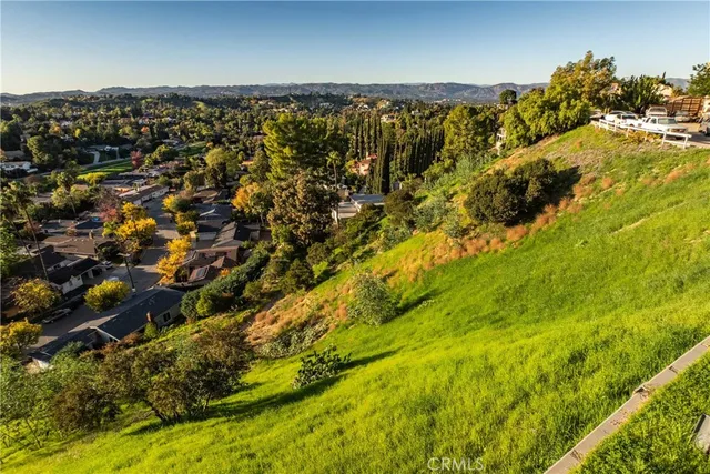 a view of outdoor space with a lake view