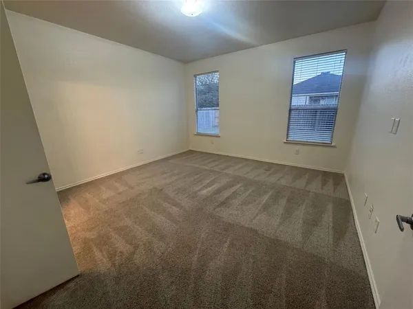 a kitchen with a sink and a stove