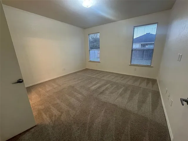 a kitchen with a sink and a stove