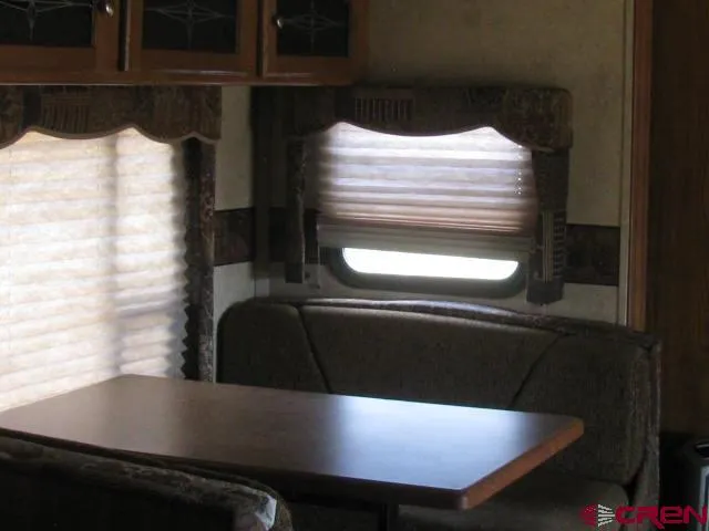 view of a fireplace with natural light