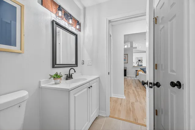 a bedroom with a bed and a cabinets