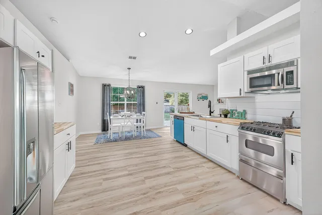 a bedroom with a bed and a cabinets