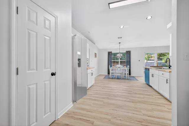 a bed room with furniture and a window