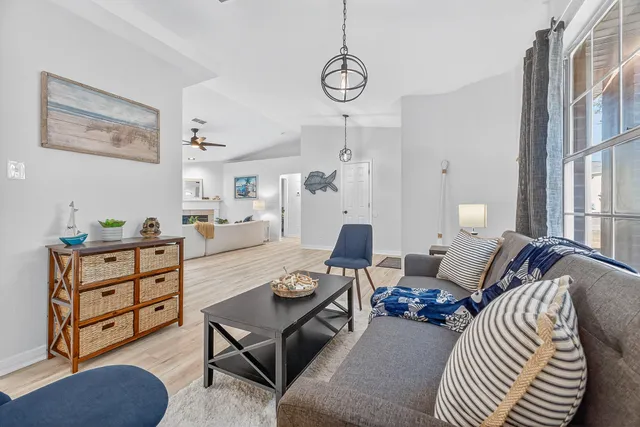 a kitchen with stainless steel appliances granite countertop a refrigerator stove and sink