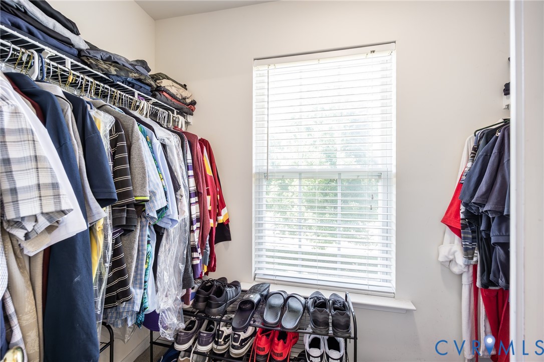 2928 Heather Ridge Drive Henrico, VA 23231 - Photo 24 of 34 Walk-in closet featuring a window with blinds, upp