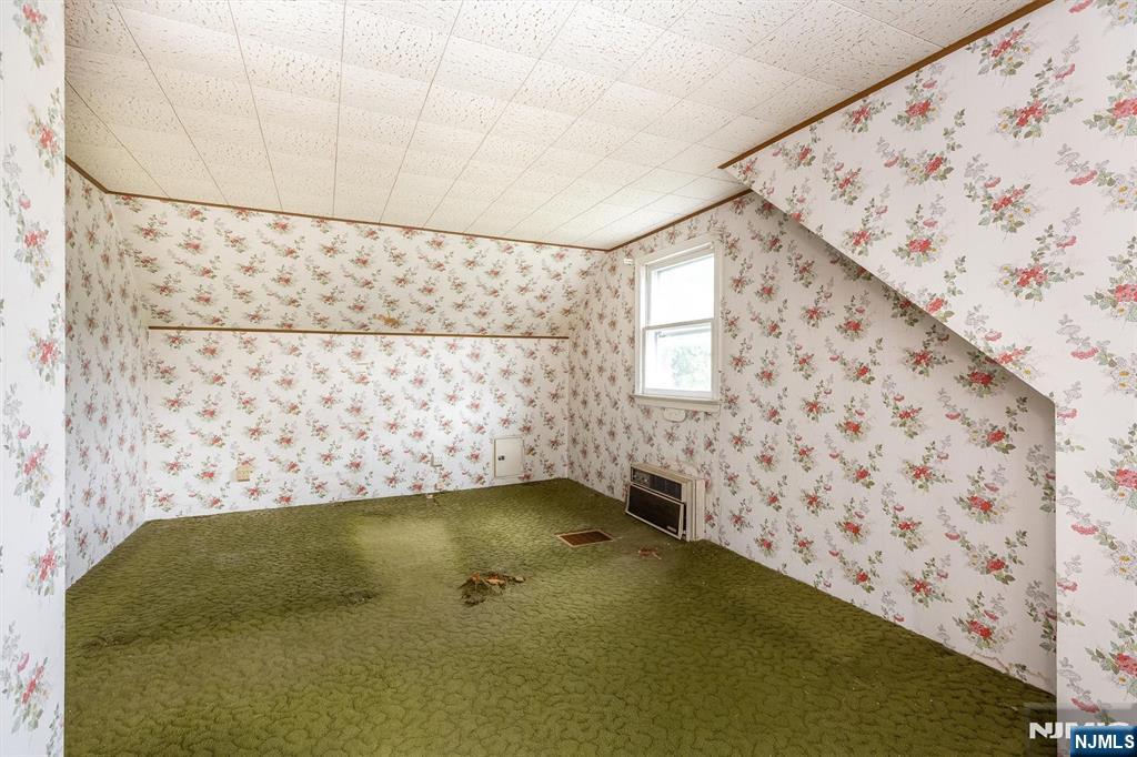 66 Coeyman Avenue Bloomfield, NJ 07003 - Photo 17 of 29 a view of a bathtub in a bathroom