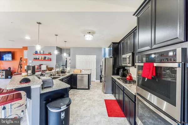 a bathroom with a sink and mirror