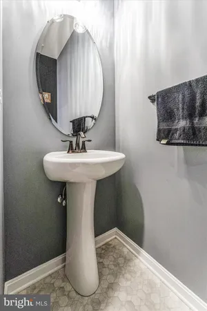 a kitchen with a table and chairs in it