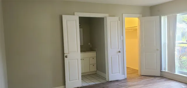 a view of front door with wooden floor