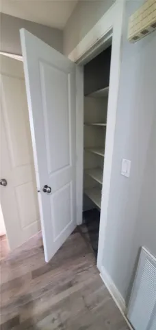 a view of an empty walk in closet