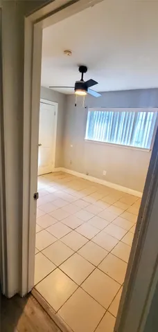 a view of a room with an entryway