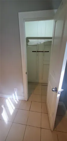 view of a utility room with empty racks