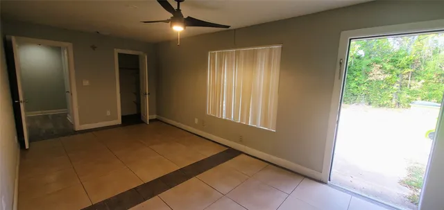 a view of a field with sitting area