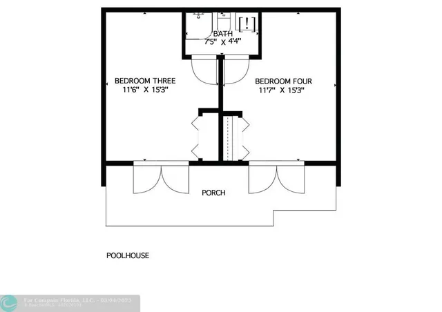 a green field with lots of trees in front of it