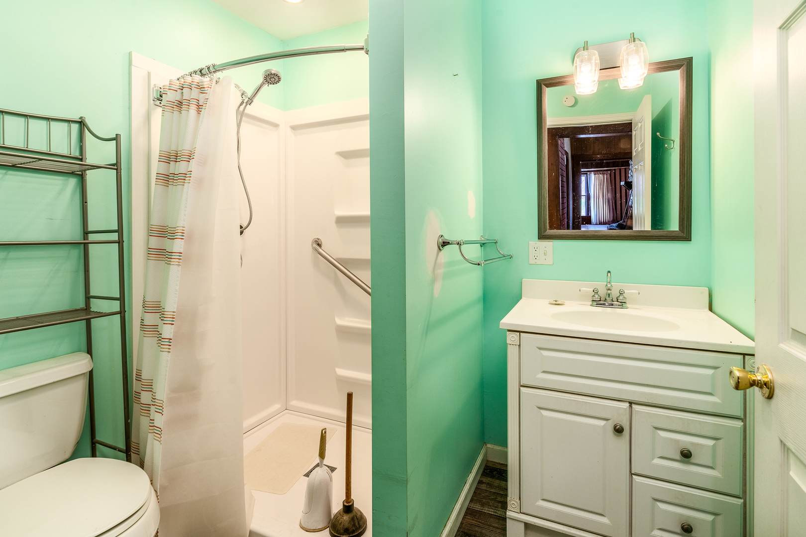15016 Harmony Church Road West Frankfort, IL 62896 - Photo 20 of 31 a bathroom with a sink a toilet and shower