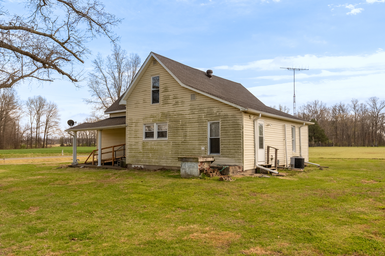 15016 Harmony Church Road West Frankfort, IL 62896 - Photo 23 of 31 a front view of house with yard and trees in the background