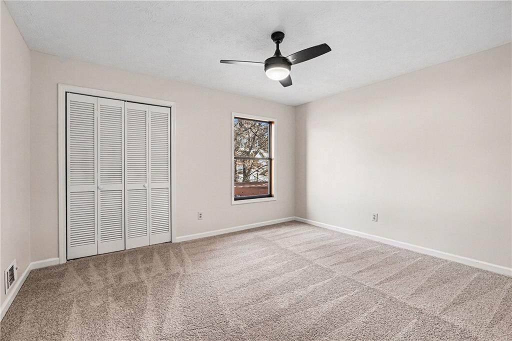 2711 Old Coach Road Duluth, GA 30096 - Photo 22 of 33 a view of an empty room with a window