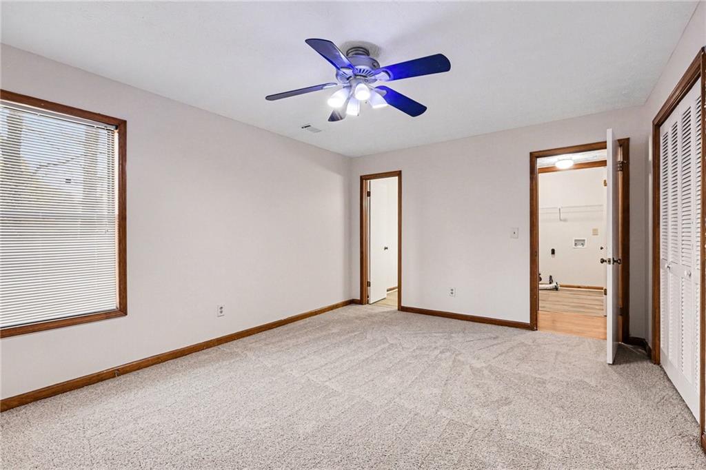 2711 Old Coach Road Duluth, GA 30096 - Photo 24 of 33 an empty room with closet and fan