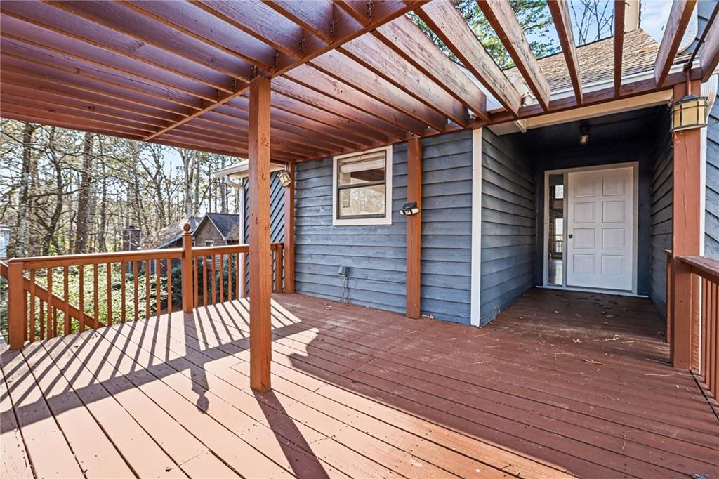 2711 Old Coach Road Duluth, GA 30096 - Photo 29 of 33 a view of a balcony with wooden floor