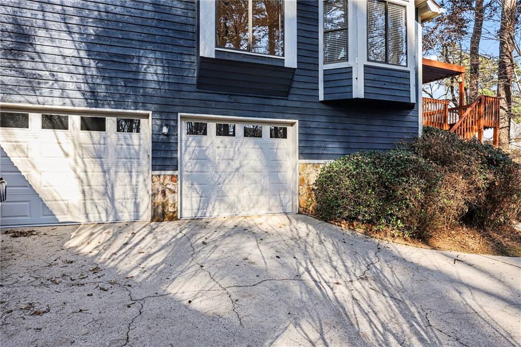 2711 Old Coach Road Duluth, GA 30096 - Photo 4 of 33 a front view of a house with a yard